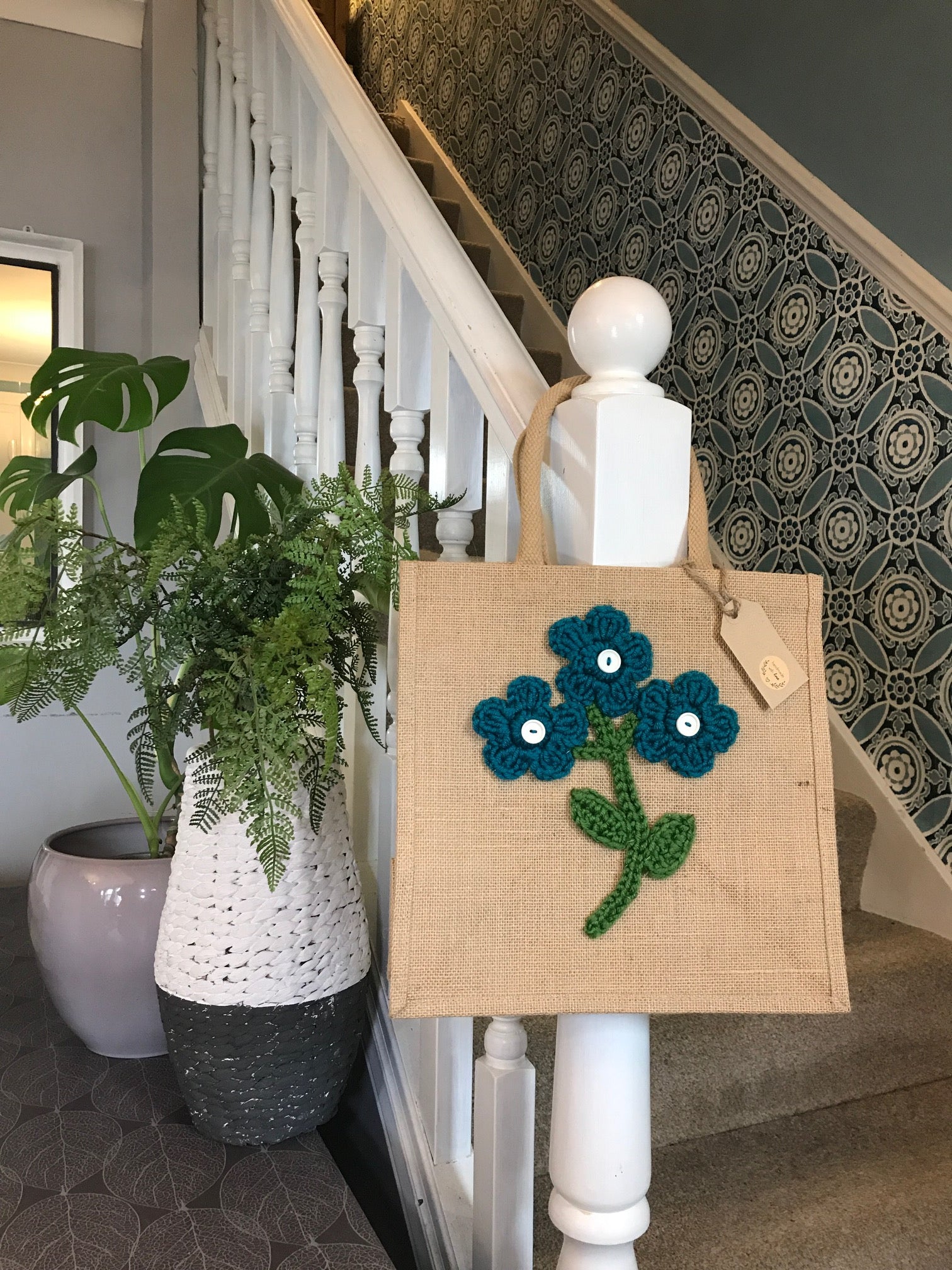 Gorgeous artisan jute bags with hand crafted crochet decoration.