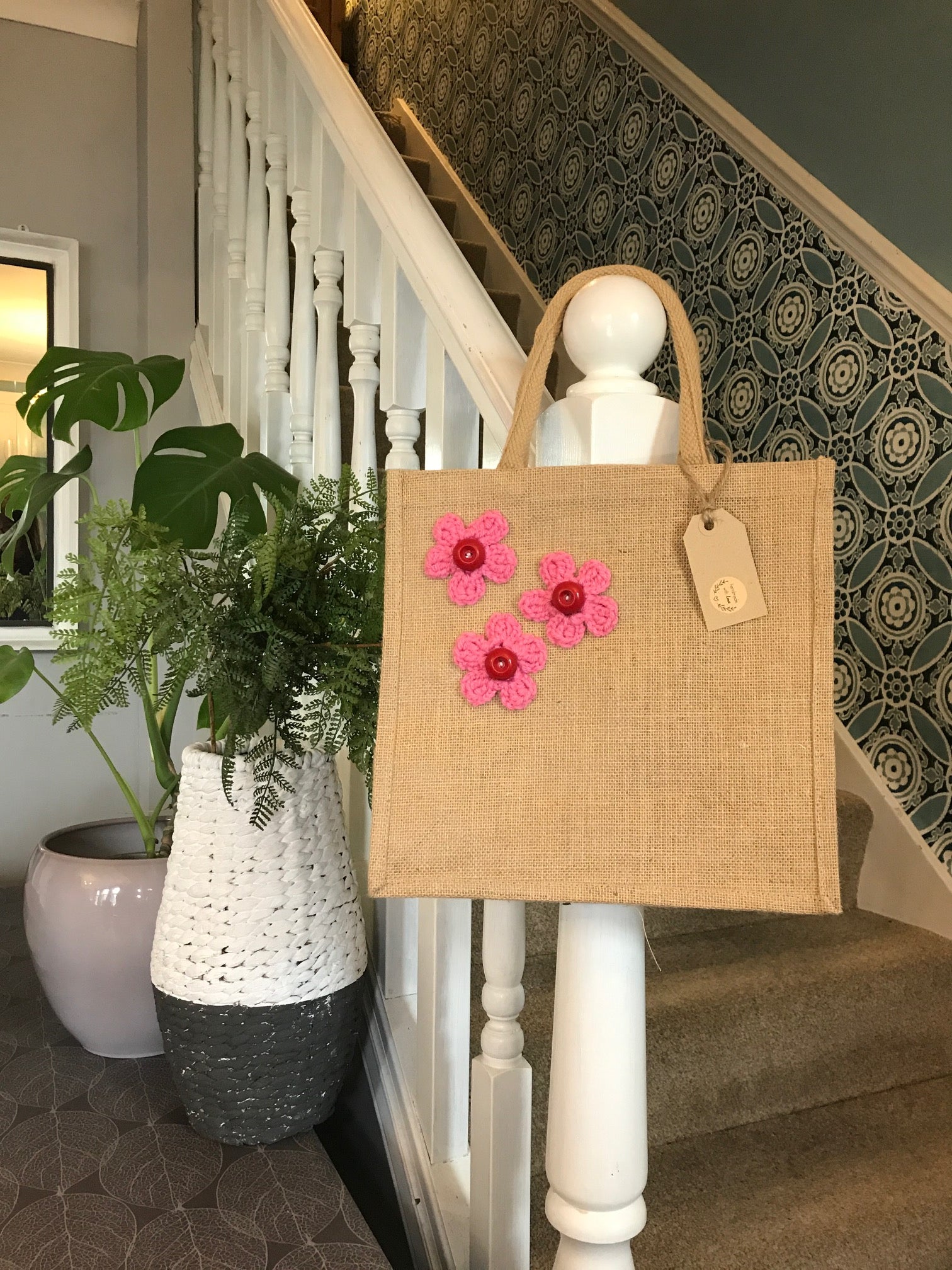 Gorgeous artisan jute bags with hand crafted crochet decoration.