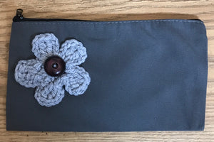 Canvas pouches with hand crocheted decoration