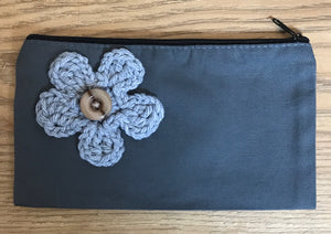 Canvas pouches with hand crocheted decoration