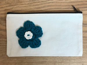 Canvas pouches with hand crocheted decoration