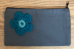 Canvas pouches with hand crocheted decoration