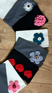 Canvas pouches with hand crocheted decoration